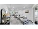 Cozy living room featuring modern decor, neutral tones, and an open layout at 4112 W Lawn Ave, Tampa, FL 33611
