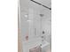 Renovated bathroom with white tiled shower and modern fixtures at 4460 67Th N St, St Petersburg, FL 33709