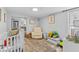 Charming Bedroom with a crib, rocking chair, and closet at 4460 67Th N St, St Petersburg, FL 33709