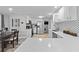 Modern kitchen featuring stainless steel appliances, white cabinets, and quartz countertops at 4460 67Th N St, St Petersburg, FL 33709