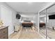 Large main bedroom offering lots of space, a king bed, and mirrored closet doors at 4460 67Th N St, St Petersburg, FL 33709