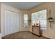 Bright bedroom featuring closet and windows for an airy and comfortable space at 4522 Lisette Cir, Brooksville, FL 34604