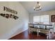 Inviting dining area featuring a rustic table, ample seating, and a decorative Gathering wall art, ideal for gatherings at 4522 Lisette Cir, Brooksville, FL 34604
