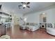 Open-concept living room features hardwood floors and neutral tones at 4522 Lisette Cir, Brooksville, FL 34604