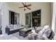 Inviting covered patio features comfortable seating and serene backyard views at 4522 Lisette Cir, Brooksville, FL 34604