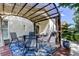 Outdoor living featuring covered patio with dining set, adjacent to the house at 4522 Lisette Cir, Brooksville, FL 34604