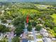 Aerial view highlighting a neighborhood with tree-lined streets, showcasing a home's location and community at 4639 Cabbage Palm Dr, Valrico, FL 33596