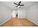 Neutral bedroom featuring a ceiling fan, and wood-look flooring at 4639 Cabbage Palm Dr, Valrico, FL 33596