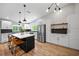 Modern kitchen features stainless steel appliances, marble countertops, and an island with seating at 4639 Cabbage Palm Dr, Valrico, FL 33596