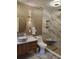Updated bathroom featuring a modern vanity, tiled shower, and stylish fixtures at 5017 E 127Th Ave, Temple Terrace, FL 33617
