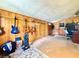 Versatile bonus room with wood-paneled walls, ideal for a home office or music studio at 6285 52Nd N Ct, St Petersburg, FL 33709