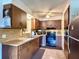 Functional kitchen with wood cabinetry, appliances and ample counter space at 6285 52Nd N Ct, St Petersburg, FL 33709
