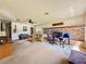Inviting living room featuring a cozy fireplace and comfortable seating arrangements at 6285 52Nd N Ct, St Petersburg, FL 33709