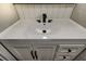 Modern bathroom features a new vanity with sleek white countertop and black hardware at 7031 Magnolia Valley Dr, New Port Richey, FL 34653