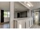 Breakfast bar with sleek white cabinets and countertops, great for entertaining and casual dining at 7031 Magnolia Valley Dr, New Port Richey, FL 34653