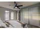 Bedroom with French doors to the yard and a spacious closet at 7031 Magnolia Valley Dr, New Port Richey, FL 34653