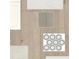 Selection of flooring samples featuring tile, wood, and hexagon-patterned designs at 719 Allora Ave, Nokomis, FL 34275