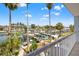 Enjoy the water views from the home's balcony, which overlooks boats and docks at 751 Pinellas Bayway S # 104, St Petersburg, FL 33715