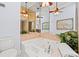 Relaxing bathroom featuring a large bathtub, tiled surround, and decorative accents at 751 Pinellas Bayway S # 104, St Petersburg, FL 33715