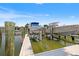 Well-maintained boat lift on a sunny day, ready for boating adventures at 751 Pinellas Bayway S # 104, St Petersburg, FL 33715