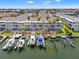 Waterfront condo with multiple docks and boats, balconies and water views at 751 Pinellas Bayway S # 104, St Petersburg, FL 33715