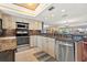 Well-equipped kitchen with stainless steel appliances and granite countertops at 751 Pinellas Bayway S # 104, St Petersburg, FL 33715