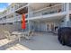 Spacious patio area with outdoor seating, staircase and easy access to the waterfront at 751 Pinellas Bayway S # 104, St Petersburg, FL 33715