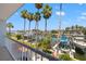 Picturesque view of the waterfront, showing boats docked along the canal and palm trees at 751 Pinellas Bayway S # 104, St Petersburg, FL 33715