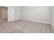 Bright bedroom with neutral walls, plush carpeting, and white trim providing a serene and comfortable living space at 7683 Deer Valley Circle, Tampa, FL 33635