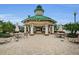 Community gazebo with tables, chairs, and lounge seating for gatherings at 8604 Herons Cove Pl, Tampa, FL 33647