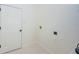 Clean, functional laundry room, ready for appliances at 8604 Herons Cove Pl, Tampa, FL 33647