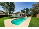 A serene private pool in a well-maintained backyard, ideal for relaxation and entertainment at 8604 Herons Cove Pl, Tampa, FL 33647