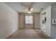 Dining area with a ceiling fan and natural light from the window at 8990 Antigua Dr, Seminole, FL 33777