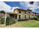 View of home featuring ten-foot wide area for patios, living area, and bedrooms upstairs and downstairs at 8990 Antigua Dr, Seminole, FL 33777