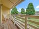 View from a balcony featuring white railings overlooking the lawn at 22706 Gage Loop # 31, Land O Lakes, FL 34639