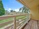 View from a balcony featuring white railings overlooking the lawn at 22706 Gage Loop # 31, Land O Lakes, FL 34639