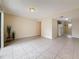 Spacious living room with tile flooring and neutral walls, creating a versatile and welcoming atmosphere at 22706 Gage Loop # 31, Land O Lakes, FL 34639