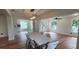 Inviting dining space with an open layout, wood floors and lots of natural light at 1027 Fountainhead Dr, Largo, FL 33770