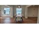 Spacious dining room with natural light and wood flooring at 1027 Fountainhead Dr, Largo, FL 33770