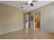 This bedroom offers an open concept feel with views to the backyard and bathroom at 1046 Middlesex Dr, New Port Richey, FL 34655