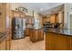 Spacious kitchen with stainless steel appliances, granite countertops and center island at 1046 Middlesex Dr, New Port Richey, FL 34655