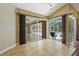 Screened Lanai with tile flooring offers views of the pool and backyard at 1046 Middlesex Dr, New Port Richey, FL 34655