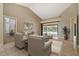 Comfortable living area showcasing an open floor plan and sliding glass doors with a view of the pool at 1046 Middlesex Dr, New Port Richey, FL 34655