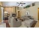 Inviting living room with a cozy fireplace, stylish furnishings, and neutral tones for a relaxing atmosphere at 1046 Middlesex Dr, New Port Richey, FL 34655