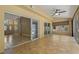 Bright and airy sun room with sliding glass doors and tile flooring throughout at 1046 Middlesex Dr, New Port Richey, FL 34655