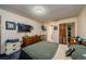 Cozy bedroom with wood-look closet doors and a light fixture at 11783 102Nd Ave, Largo, FL 33778