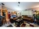 Comfortable living room features two couches, fan, and cozy decor at 11783 102Nd Ave, Largo, FL 33778