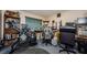 Home office area with a large window and gray carpeting at 11783 102Nd Ave, Largo, FL 33778