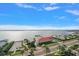 Expansive aerial view showcasing the waterfront location with stunning water views and the surrounding community amenities at 1340 Gulf Blvd # 12A, Clearwater Beach, FL 33767
