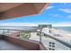 Balcony view showcasing a coastline, beach and neighboring buildings on a clear day at 1340 Gulf Blvd # 12A, Clearwater Beach, FL 33767